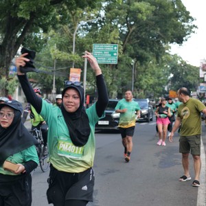 Race photo from BAUR RUN 2025