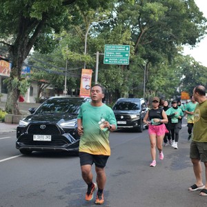 Race photo from BAUR RUN 2025