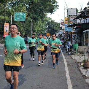 Race photo from BAUR RUN 2025