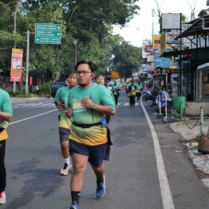 Race photo from BAUR RUN 2025