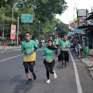 Race photo from BAUR RUN 2025