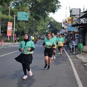 Race photo from BAUR RUN 2025