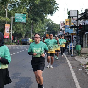 Race photo from BAUR RUN 2025