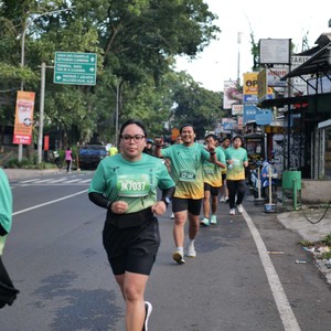 Race photo from BAUR RUN 2025