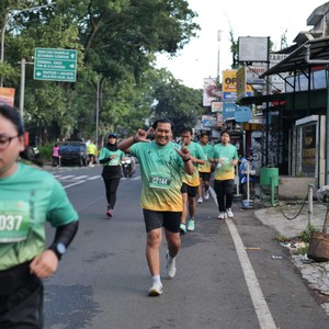 Race photo from BAUR RUN 2025