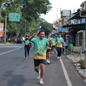 Race photo from BAUR RUN 2025