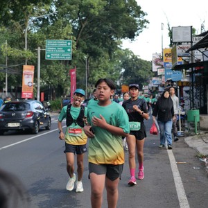 Race photo from BAUR RUN 2025