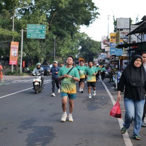 Race photo from BAUR RUN 2025
