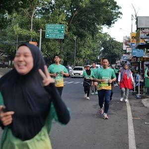 Race photo from BAUR RUN 2025