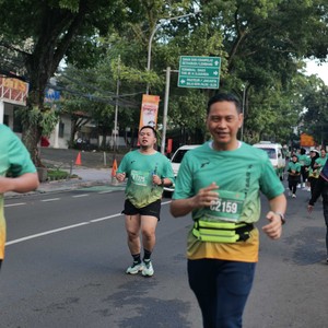 Race photo from BAUR RUN 2025