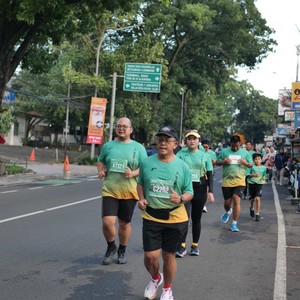 Race photo from BAUR RUN 2025