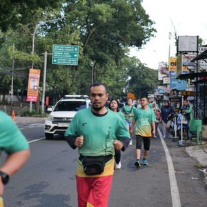 Race photo from BAUR RUN 2025