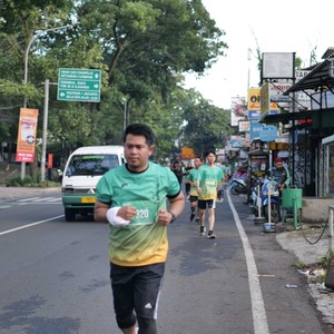Race photo from BAUR RUN 2025