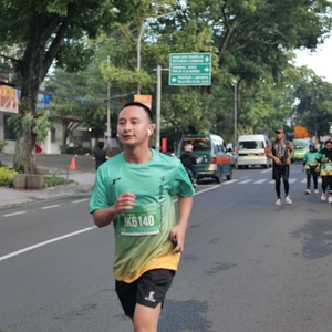Race photo from BAUR RUN 2025