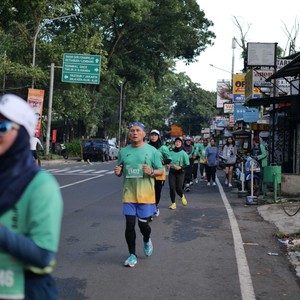 Race photo from BAUR RUN 2025