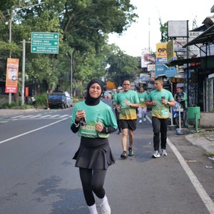 Race photo from BAUR RUN 2025