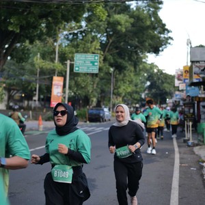 Race photo from BAUR RUN 2025