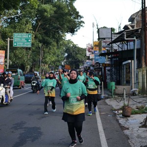 Race photo from BAUR RUN 2025