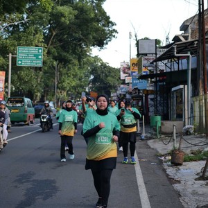 Race photo from BAUR RUN 2025