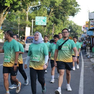 Race photo from BAUR RUN 2025