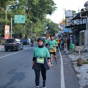 Race photo from BAUR RUN 2025