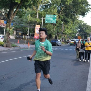 Race photo from BAUR RUN 2025