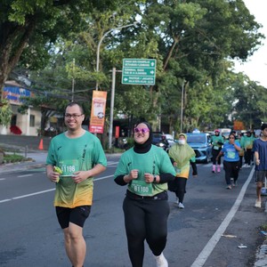 Race photo from BAUR RUN 2025
