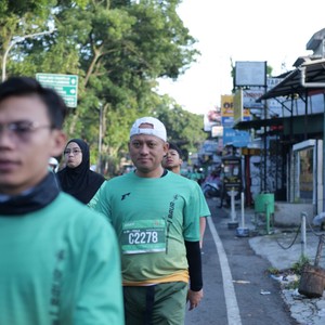 Race photo from BAUR RUN 2025