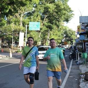 Race photo from BAUR RUN 2025