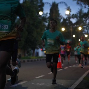 Race photo from BAUR RUN 2025