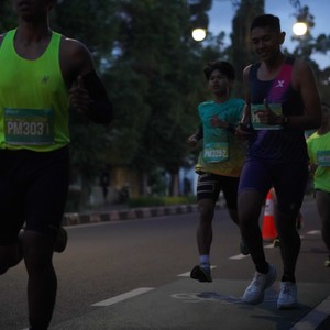 Race photo from BAUR RUN 2025