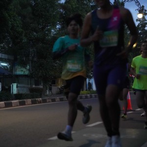 Race photo from BAUR RUN 2025