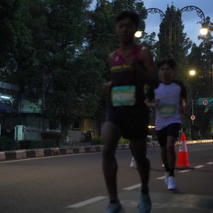 Race photo from BAUR RUN 2025