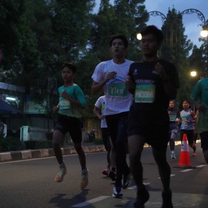 Race photo from BAUR RUN 2025