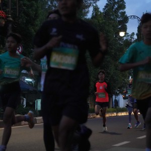 Race photo from BAUR RUN 2025