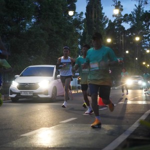 Race photo from BAUR RUN 2025