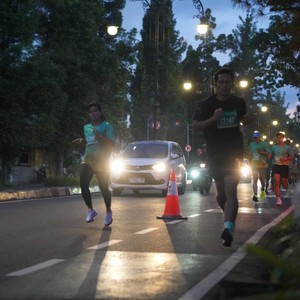 Race photo from BAUR RUN 2025