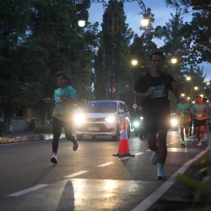 Race photo from BAUR RUN 2025