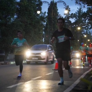 Race photo from BAUR RUN 2025