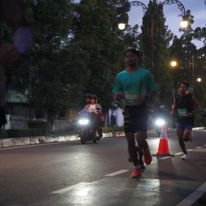 Race photo from BAUR RUN 2025