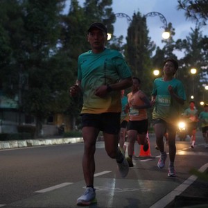 Race photo from BAUR RUN 2025