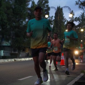 Race photo from BAUR RUN 2025