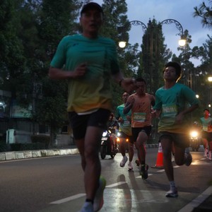 Race photo from BAUR RUN 2025