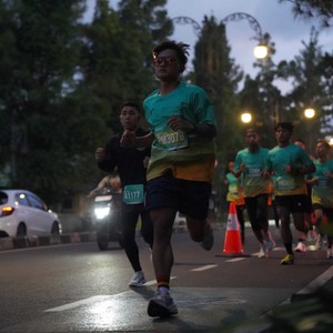Race photo from BAUR RUN 2025