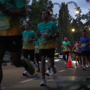 Race photo from BAUR RUN 2025