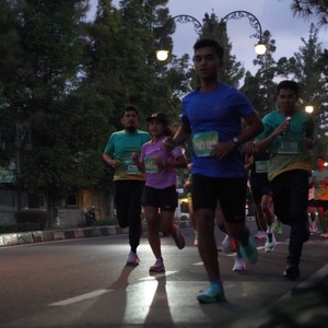 Race photo from BAUR RUN 2025
