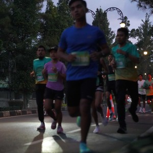 Race photo from BAUR RUN 2025