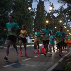 Race photo from BAUR RUN 2025