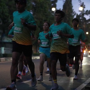Race photo from BAUR RUN 2025