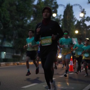 Race photo from BAUR RUN 2025